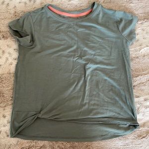 Hi! i’m selling an athleta girl green top!